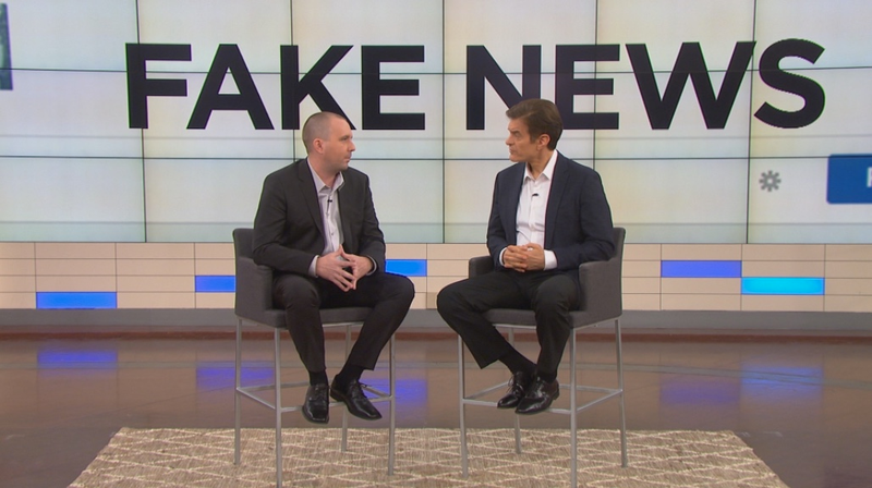Jestin Coler, owner of a company that runs dozens of fake news websites, sitting with Dr. Oz on today’s episode about fake news (Dr. Oz Show)